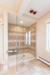 On-demand hot water in this custom shower